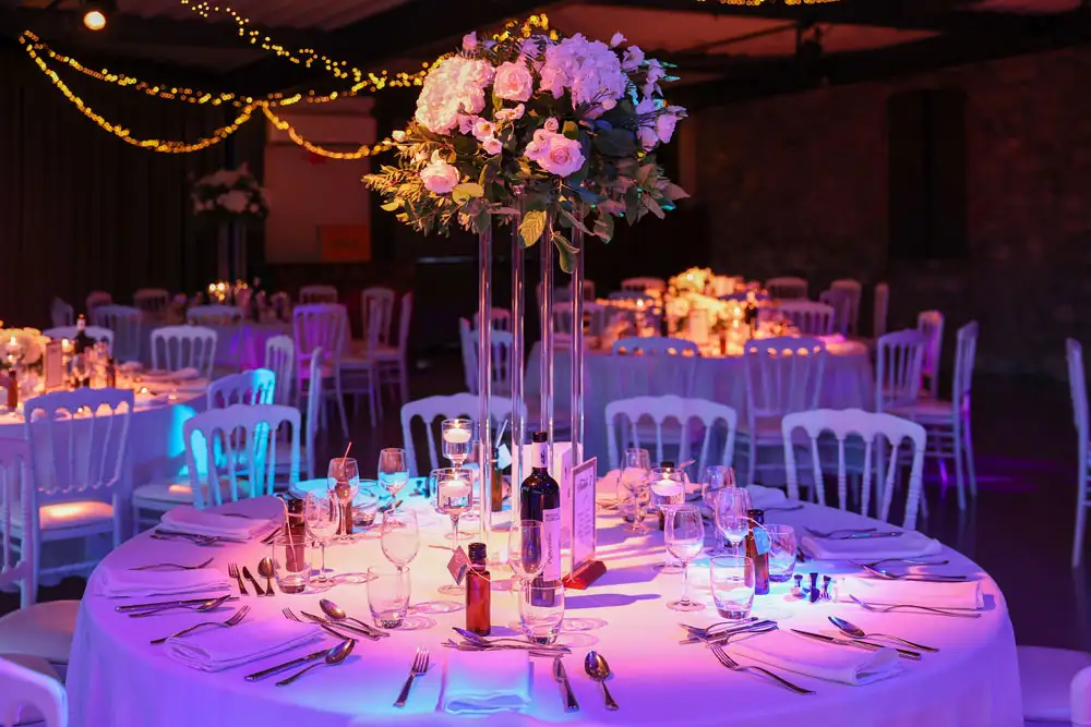 Centre de table mariage haut sur sellette transparente